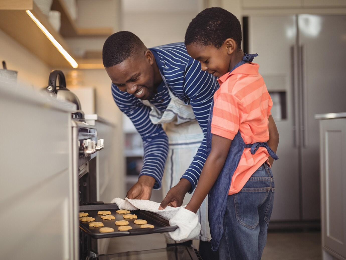 Father and Son Baking Cookies